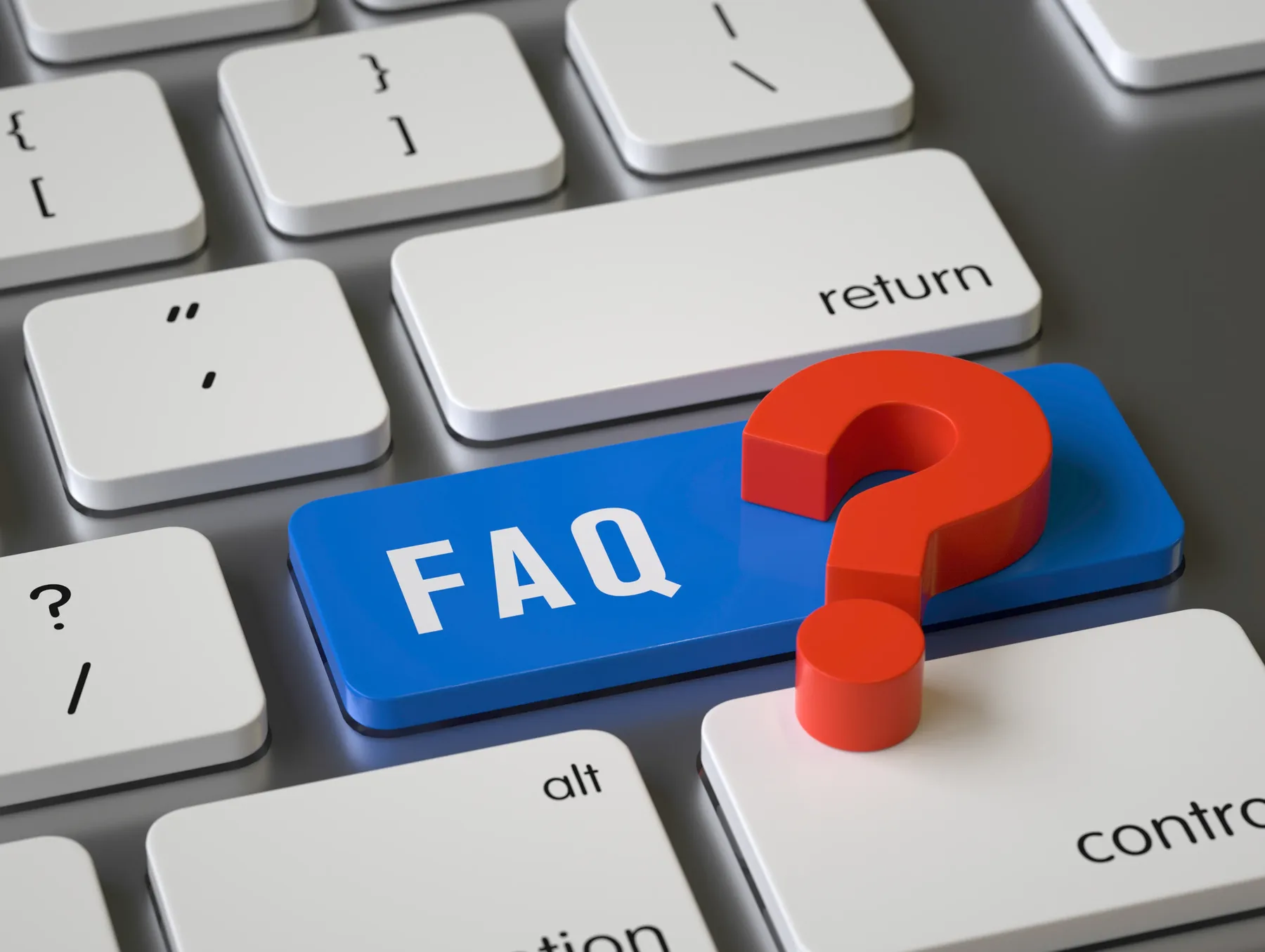 A computer keyboard with a blue FAQ key and a red three-dimensional question mark resting on it.